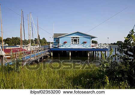 "Die Schleiperle Restaurant built on poles in the Schlei River near Arnis, the smallest town in Germany, Schleswig-Holstein, Germany, Europe" View Large Photo Image Stock Image - "Die Schleiperle Restaurant built on poles in the Schlei River near Arnis, the smallest town in Germany, Schleswig-Holstein, Germany, Europe". Fotosearch