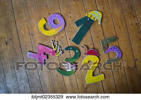"Different numbers lying on floorboards, at a forest kindergarten, Ilmmuenster, Bavaria, Germany, Europe" View Large Photo Image Stock Photo - "Different numbers lying on floorboards, at a forest kindergarten, Ilmmuenster, Bavaria, Germany, Europe". Fotosearch