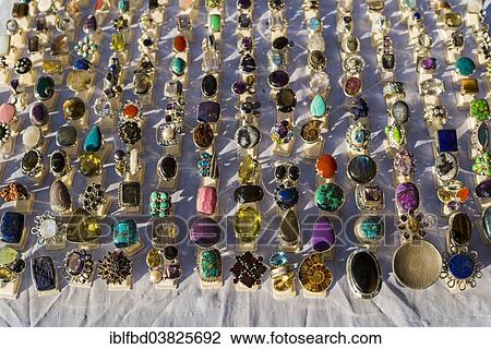 "Different rings for sale at the weekly flea market, Anjuna, Goa, India, Asia" View Large Photo Image Stock Image - "Different rings for sale at the weekly flea market, Anjuna, Goa, India, Asia". Fotosearch