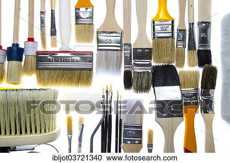 Different types of brushes and a paint roller View Large Photo Image Stock Image - Different types of brushes and a paint roller. Fotosearch