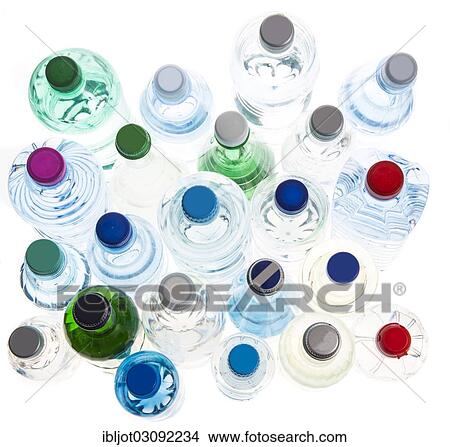 Different varieties of mineral water in bottles made of glass and plastic or PET View Large Photo Image Picture - Different varieties of mineral water in bottles made of glass and plastic or PET. Fotosearch