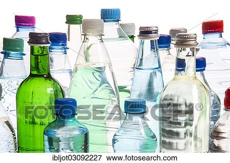 Different varieties of mineral water in bottles made of glass and plastic or PET View Large Photo Image Stock Photo - Different varieties of mineral water in bottles made of glass and plastic or PET. Fotosearch