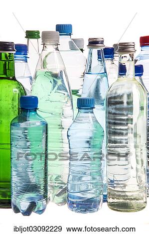 Different varieties of mineral water in bottles made of glass and plastic or PET View Large Photo Image Stock Photo - Different varieties of mineral water in bottles made of glass and plastic or PET. Fotosearch