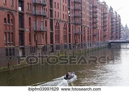 "Dinghy on Elbe water canal, Speicherstadt, Hamburg, Germany, Europe" View Large Photo Image Stock Photo - "Dinghy on Elbe water canal, Speicherstadt, Hamburg, Germany, Europe". Fotosearch