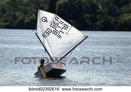 "Dinghy sailing for children, optimist on the Mueritz, Mecklenburg Lake District, Mecklenburg-Western Pomerania, Germany, Europe" View Large Photo Image Stock Photograph - "Dinghy sailing for children, optimist on the Mueritz, Mecklenburg Lake District, Mecklenburg-Western Pomerania, Germany, Europe". Fotosearch