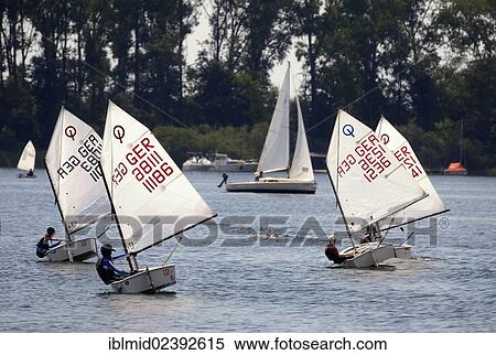 "Dinghy sailing for children, optimists on the Mueritz, Mecklenburg Lake District, Mecklenburg-Western Pomerania, Germany, Europe" View Large Photo Image Stock Photography - "Dinghy sailing for children, optimists on the Mueritz, Mecklenburg Lake District, Mecklenburg-Western Pomerania, Germany, Europe". Fotosearch