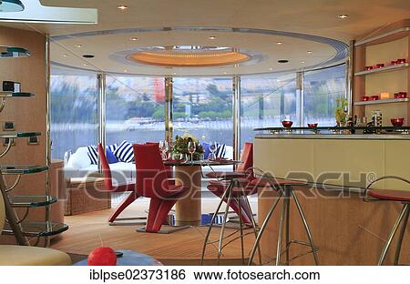 "Dining area and bar on the main deck, Leonardo II, a cruiser built by Azimut, type of boat: Leonardo 98, length: 30. 15 m, built in 2004, French Riviera, France, Mediterranean Sea, Europe" View Large Photo Image Stock Photograph - "Dining area and bar on the main deck, Leonardo II, a cruiser built by Azimut, type of boat: Leonardo 98, length: 30. 15 m, built in 2004, French Riviera, France, Mediterranean Sea, Europe". Fotosearch