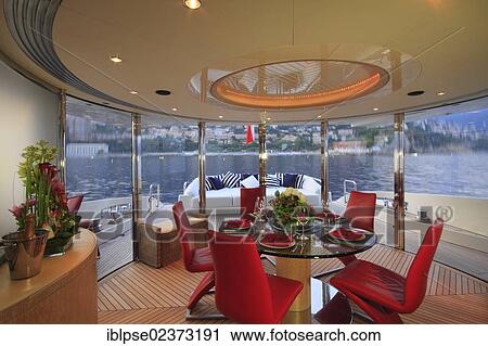 "Dining area on the main deck, Leonardo II, a cruiser built by Azimut, type of boat: Leonardo 98, length: 30. 15 m, built in 2004, French Riviera, France, Mediterranean Sea, Europe" View Large Photo Image Stock Image - "Dining area on the main deck, Leonardo II, a cruiser built by Azimut, type of boat: Leonardo 98, length: 30. 15 m, built in 2004, French Riviera, France, Mediterranean Sea, Europe". Fotosearch