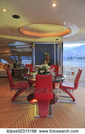 "Dining area on the main deck, Leonardo II, a cruiser built by Azimut, type of boat: Leonardo 98, length: 30. 15 m, built in 2004, French Riviera, France, Mediterranean Sea, Europe" View Large Photo Image Stock Photo - "Dining area on the main deck, Leonardo II, a cruiser built by Azimut, type of boat: Leonardo 98, length: 30. 15 m, built in 2004, French Riviera, France, Mediterranean Sea, Europe". Fotosearch