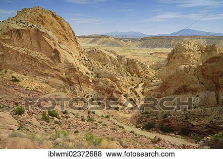 Stock Photo - "Dirt road, Notom-Bullfrog Road winding through the Muley Twist Canyon, Capitol Reef National Park, Utah, USA". Fotosearch