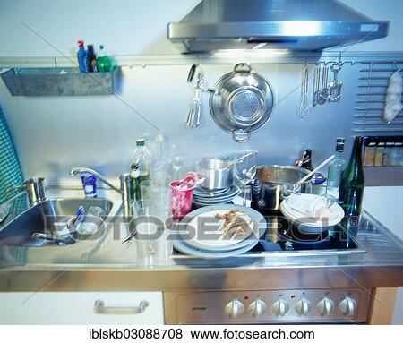 Stock Photo - Dirty dishes in a kitchen. Fotosearch