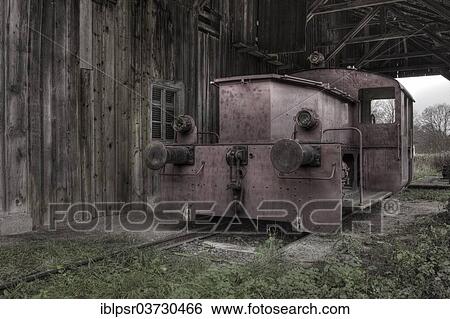 Stock Photograph - "Discarded diesel locomotive in the Bavarian peat and bog museum, Rottau, Grassau, Upper Bavaria, Bavaria, Germany, Europe". Fotosearch