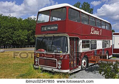 Stock Photography - "Discarded English double-decker, converted into a bistro, Museumshafen museum harbor, Greifswald, Mecklenburg-Western Pomerania, Germany, Europe". Fotosearch