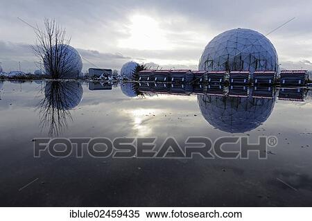 Stock Photography - "Discarded radar domes, radomes, reflected in the water on a former military site, Mietraching, Bavaria, Germany, Europe". Fotosearch