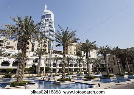 District built in the traditional style, Downtown Dubai, The Old Town, in front of a skyscraper, The Address, a luxury hotel, Dubai, United Arab Emirates, Middle East, Asia View Large Photo Image Stock Photo - District built in the traditional style, Downtown Dubai, The Old Town, in front of a skyscraper, The Address, a luxury hotel, Dubai, United Arab Emirates, Middle East, Asia. Fotosearch