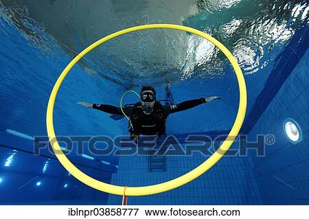 "Dive training, scuba diver balancing in a swimming pool, Nuremberg, Bavaria, Germany, Europe" View Large Photo Image Stock Photo - "Dive training, scuba diver balancing in a swimming pool, Nuremberg, Bavaria, Germany, Europe". Fotosearch