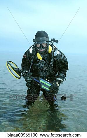 "Diver with metal detector searching for underwater treasure, Lake Baikal, Siberia, Russia, Europe" View Large Photo Image Stock Image - "Diver with metal detector searching for underwater treasure, Lake Baikal, Siberia, Russia, Europe". Fotosearch