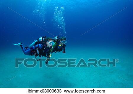 "Divers under water, Mimaropa, Mulaong, South China Sea, Philippines, Asia, Binalayan, -, Philippines, Asia" View Large Photo Image Stock Image - "Divers under water, Mimaropa, Mulaong, South China Sea, Philippines, Asia, Binalayan, -, Philippines, Asia". Fotosearch