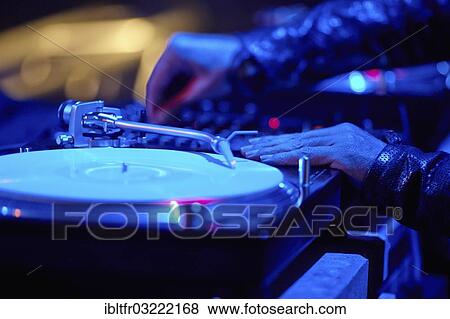 Stock Photo - "DJ at the turntables, Mayday 2013 techno festival in the Westfalenhalle Dortmund, Dortmund, Ruhr district, North Rhine-Westphalia, Germany, Europe". Fotosearch
