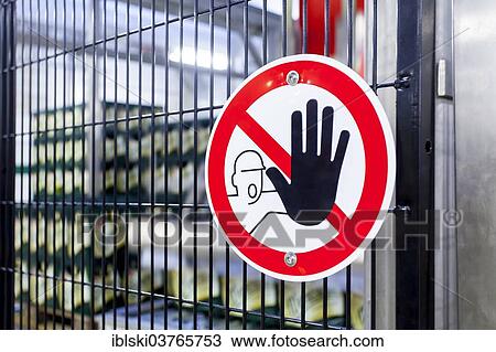 Stock Image - "Do not enter, warning sign on a security fence, Germany, Europe". Fotosearch