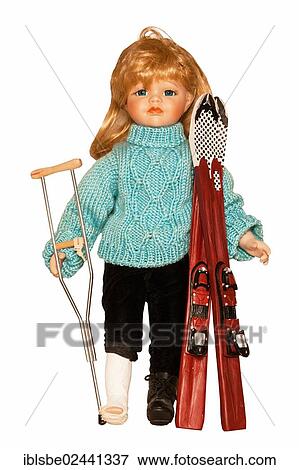 Doll with ski clothing and skis with her foot in plaster and holding a crutch following a ski accident View Large Photo Image Stock Photo - Doll with ski clothing and skis with her foot in plaster and holding a crutch following a ski accident. Fotosearch