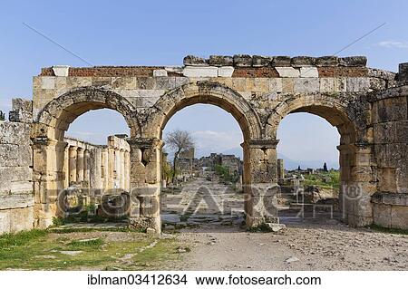 "Domitian Gate and street with colonnade, ancient city of Hierapolis, Hierapolis, near Pamukkale, Denizli Province, Aegean Region, Turkey, Asia" View Large Photo Image Picture - "Domitian Gate and street with colonnade, ancient city of Hierapolis, Hierapolis, near Pamukkale, Denizli Province, Aegean Region, Turkey, Asia". Fotosearch