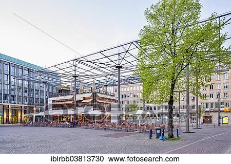Stock Image - "Domshof Forum, a glass roof over Domshof square, architect Joachim Schurmann, Cafe, Bremen, Germany, Europe". Fotosearch