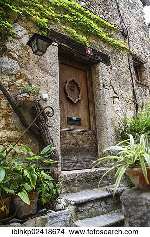 Picture - Door, historic district, Tourrettes sur Loup, France, Europe. Fotosearch
