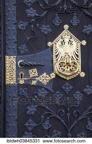 "Door lock with a golden metal mount and the city coat of arms of Frankfurt, Romer building, town hall, Romerberg, Frankfurt am Main, Hesse, Germany, Europe" View Large Photo Image Stock Image - "Door lock with a golden metal mount and the city coat of arms of Frankfurt, Romer building, town hall, Romerberg, Frankfurt am Main, Hesse, Germany, Europe". Fotosearch