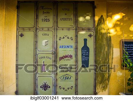 "Door of a liquor store, Forcalquier, Provence, Provence-Alpes-Cote, France, Europe, Forcalquier, Forcalquier, Departement Alpes-de-Haute-Provence, Region Provence-Alpes-Cote d? ÇÖAzur, France, Europe" View Large Photo Image Stock Image - "Door of a liquor store, Forcalquier, Provence, Provence-Alpes-Cote, France, Europe, Forcalquier, Forcalquier, Departement Alpes-de-Haute-Provence, Region Provence-Alpes-Cote d? ÇÖAzur, France, Europe". Fotosearch