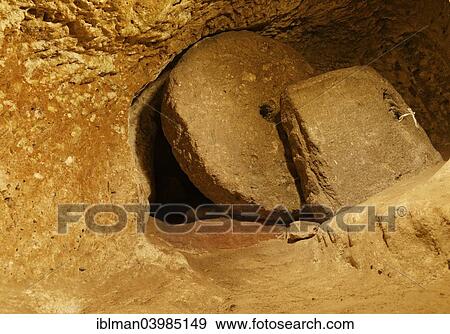 "Door with a rolling stone, Derinkuyu Underground City, Nevsehir Province, Cappadocia, Central Anatolia Region, Anatolia, Turkey, Asia" View Large Photo Image Stock Photo - "Door with a rolling stone, Derinkuyu Underground City, Nevsehir Province, Cappadocia, Central Anatolia Region, Anatolia, Turkey, Asia". Fotosearch