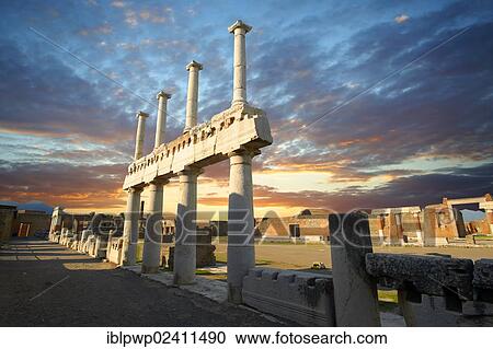 Stock Image - "Doric and Corinthian columns of the Roman colonnade in the Forum of Pompeii, Italy, Europe". Fotosearch