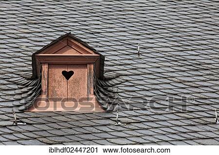 "Dormer in a slate roof, shutters with heart, Germany, Europe" View Large Photo Image Stock Image - "Dormer in a slate roof, shutters with heart, Germany, Europe". Fotosearch