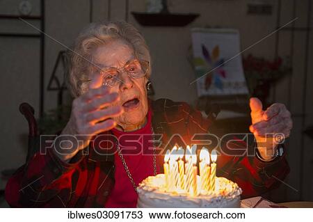 "Dorothy Newell celebrates her 99th birthday, with a birthday cake with candles, Sterling Heights, Michigan, United States, North America" View Large Photo Image Stock Image - "Dorothy Newell celebrates her 99th birthday, with a birthday cake with candles, Sterling Heights, Michigan, United States, North America". Fotosearch