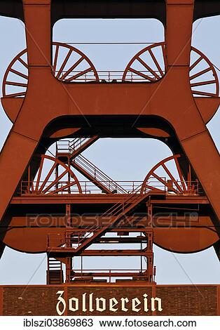 Stock Image - "Double headframe of shaft XII, Zeche Zollverein, UNESCO World Heritage Site, Essen, Ruhr district, North Rhine-Westphalia, Germany, Europe". Fotosearch