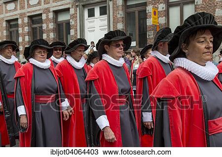Stock Image - "Doudou City Festival, procession of 1, 500 people, some in original costumes, since 13th century, European Capital of Culture 2015, Mons, Wallonia, Belgium, Europe". Fotosearch