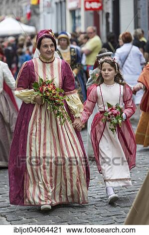 "Doudou City Festival, procession of 1, 500 people, some in original costumes, since 13th century, European Capital of Culture 2015, Mons, Wallonia, Belgium, Europe" View Large Photo Image Stock Image - "Doudou City Festival, procession of 1, 500 people, some in original costumes, since 13th century, European Capital of Culture 2015, Mons, Wallonia, Belgium, Europe". Fotosearch