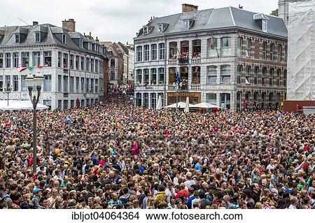 Picture - "Doudou City Festival, since 13th century, culminating in the Lumecon, the Battle of St. George with the dragon, in front of tens of thousands of specators, Grand Place, European Capital of Culture 2015, Mons, Wallonia, Belgium, Europe". Fotosearch