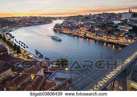 "Douro river and the historic centre of Ribeira at sunset, Porto, Unesco World Heritage Site, Portugal, Europe" View Large Photo Image Stock Photo - "Douro river and the historic centre of Ribeira at sunset, Porto, Unesco World Heritage Site, Portugal, Europe". Fotosearch