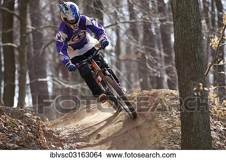 "Downhill mountain biker, Bikepark Beerfelden, Odenwald, Hesse, Germany, Europe" View Large Photo Image Picture - "Downhill mountain biker, Bikepark Beerfelden, Odenwald, Hesse, Germany, Europe". Fotosearch