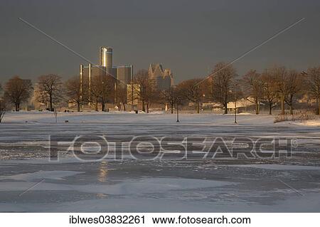 Stock Image - "Downtown Detroit from Belle Isle, a city park in the middle of the river, with the island's frozen Scott Fountain Lagoon at the front, Detroit, Michigan, United States, North America". Fotosearch