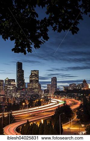 Stock Image - "Downtown with highway at night, Seattle, Washington, United States, North America". Fotosearch