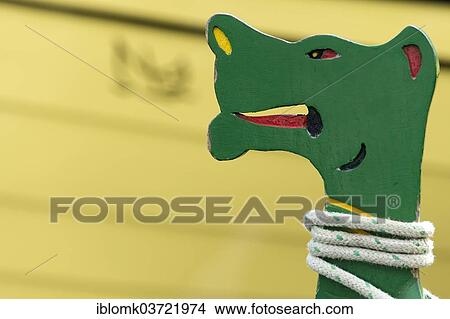 "Dragon figure on the bow of a rowing boat, Klaksvik, Borooy, Norooyar, Faroe Islands, Denmark, Europe" View Large Photo Image Picture - "Dragon figure on the bow of a rowing boat, Klaksvik, Borooy, Norooyar, Faroe Islands, Denmark, Europe". Fotosearch