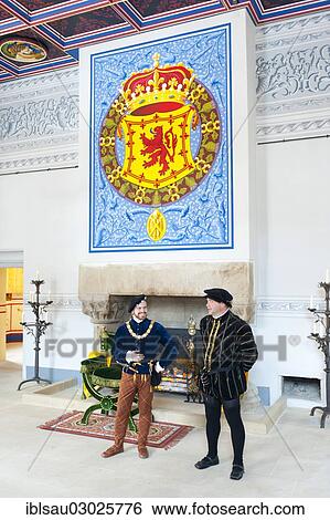 "Drama, two men wearing medieval clothes, old coat of arms of the Kings of Scotland in Stirling Castle Palace, Stirling, Scotland, United Kingdom, Europe" View Large Photo Image Stock Photograph - "Drama, two men wearing medieval clothes, old coat of arms of the Kings of Scotland in Stirling Castle Palace, Stirling, Scotland, United Kingdom, Europe". Fotosearch