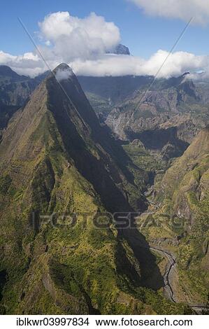 Picture - "Dramatic clouds above Piton Cabris and Canyon des Riviere des Galets, Mafate basin, Cirque de Mafate, Reunion, Africa". Fotosearch