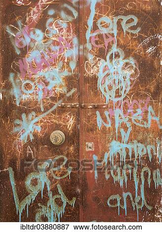 "Drawings and writings on a rusty door, Arcos de la Frontera, Cadiz province, Andalusia, Spain, Europe" View Large Photo Image Stock Photo - "Drawings and writings on a rusty door, Arcos de la Frontera, Cadiz province, Andalusia, Spain, Europe". Fotosearch