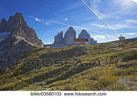 "Dreizinnenhuette or Three Peaks Alpine hut and chapel in front of the north face of the Three Peaks, Sextner Dolomiten, South Tyrol province, Trentino-Alto Adige, Italy, Europe" View Large Photo Image Stock Image - "Dreizinnenhuette or Three Peaks Alpine hut and chapel in front of the north face of the Three Peaks, Sextner Dolomiten, South Tyrol province, Trentino-Alto Adige, Italy, Europe". Fotosearch