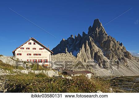 "Dreizinnenhuette or Three Peaks Alpine hut in front of Paternkofel Mountain, Sextner Dolomiten, South Tyrol province, Trentino-Alto Adige, Italy, Europe" View Large Photo Image Stock Image - "Dreizinnenhuette or Three Peaks Alpine hut in front of Paternkofel Mountain, Sextner Dolomiten, South Tyrol province, Trentino-Alto Adige, Italy, Europe". Fotosearch