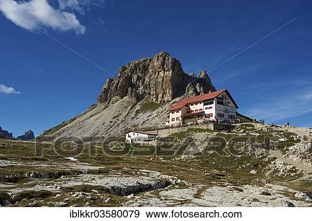 "Dreizinnenhuette or Three Peaks Alpine hut with Toblinger Knoten Mountain, Sextner Dolomiten, South Tyrol province, Trentino-Alto Adige, Italy, Europe" View Large Photo Image Stock Photo - "Dreizinnenhuette or Three Peaks Alpine hut with Toblinger Knoten Mountain, Sextner Dolomiten, South Tyrol province, Trentino-Alto Adige, Italy, Europe". Fotosearch