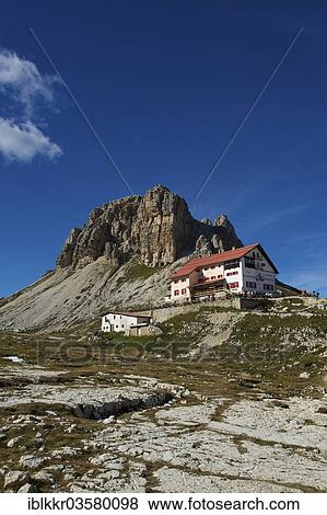 "Dreizinnenhuette or Three Peaks Alpine hut with Toblinger Knoten Mountain, Sextner Dolomiten, South Tyrol province, Trentino-Alto Adige, Italy, Europe" View Large Photo Image Stock Photo - "Dreizinnenhuette or Three Peaks Alpine hut with Toblinger Knoten Mountain, Sextner Dolomiten, South Tyrol province, Trentino-Alto Adige, Italy, Europe". Fotosearch